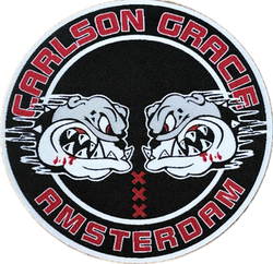The Carlson Gracie Amsterdam patch: two bulldogs facing each other above the three Saint Andrew's crosses of Amsterdam.